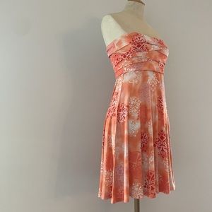CLASSIQUE peach jersey strapless dress w/ damask motif & pleated bodice.